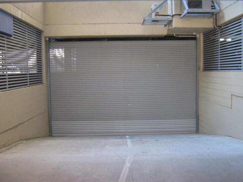 Roller shutter across a car park entrance