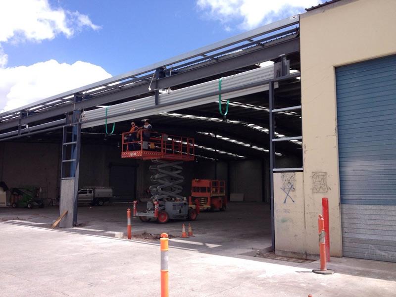 Industrial roller door at the end of a warehouse loading bay